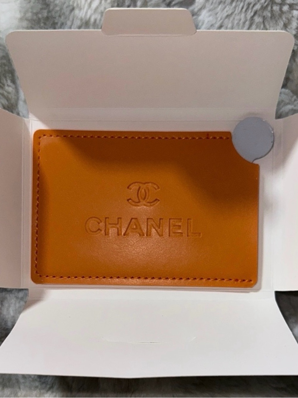 CHANEL Orange Leather Card & Mirror Holder with Embossed Logo